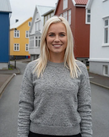 Sigríður, 28, Icelandic woman from Reykjavik wearing an Icelandic wool sweater on a colorful street